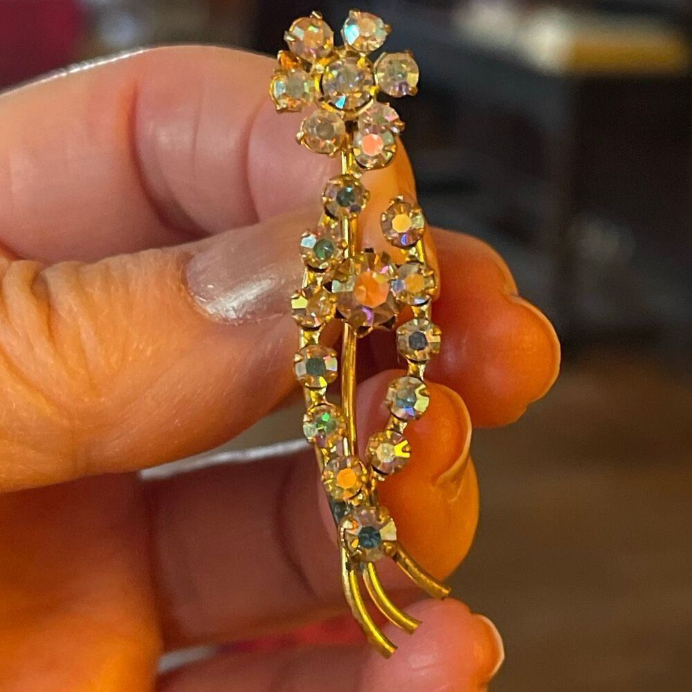 Vintage Aurora Borealis floral brooch prong set.